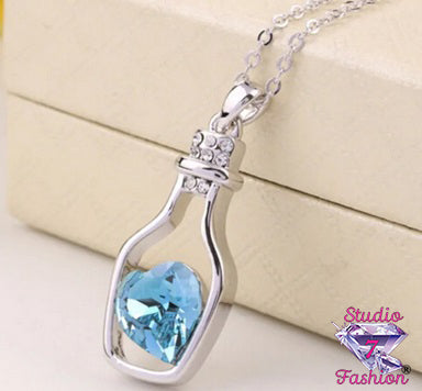 Miniature Blue Heart In Bottle Necklace