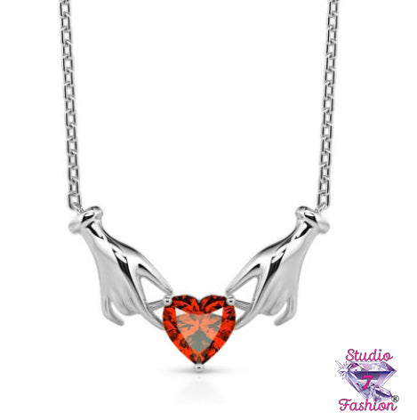 Elegant Hands Holding Ruby Heart Necklace